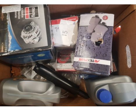 A collection of automotive items to include brake pads, alternator, light together with Headlight unit and used wing mirrors 