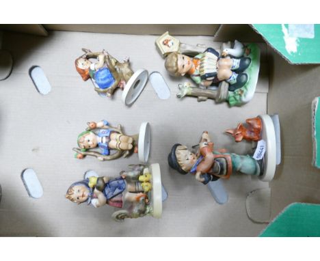 A collection of Goebel figures to include Apple Boy, Apple Girl, Accordion Boy &amp; similar (5) 