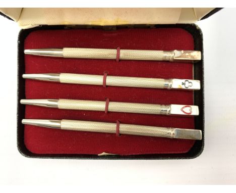 Set of 4 engine turned sterling silver bridge pencils, cased Condition Report & Further Details Click here for further images