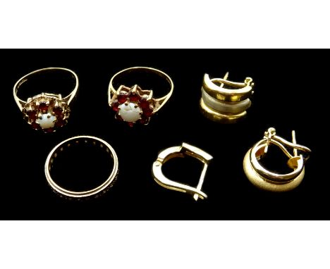 Two 14ct white and yellow gold hoop earrings, single 14ct gold stone set earring earring, all stamped 585, two gold garnet an