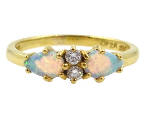 18ct gold pear shaped opal and diamond ring, hallmarked Condition Report & Further Details Approx 2.33gm, size KClick here fo