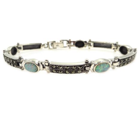 Silver oval opal and marcasite bracelet, stamped 925 Condition Report & Further Details Click here for further images, condit