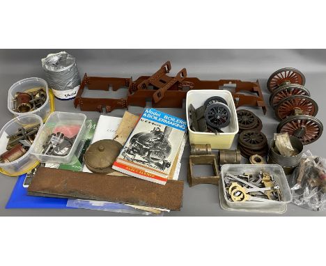 Model steam locomotive chassis, wheels &amp; other parts along with model train books &amp; plans for a model of Maisie&nbsp;