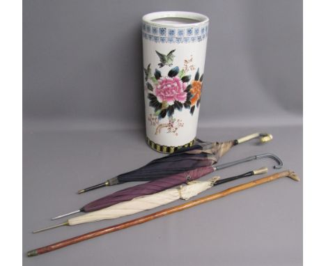 Oriental design stick stand (cracked) with birds head cane and 3 vintage umbrellas
