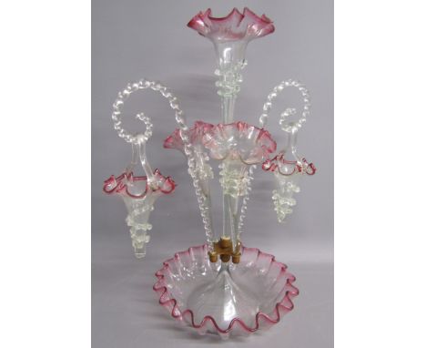 Glass table centre epergne - main fluted bowl with pink edge - 2 trumpets and 2 twist canes with hanging baskets and larger c