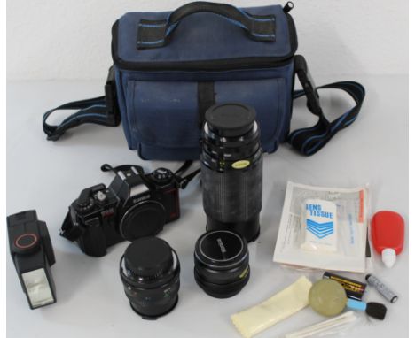 Konica TX-X camera body, Vivitar 28mm wide angle lens, Konica 50mm lens, Vivitar 70-210 zoom lens, Hanimex flash unit, Camera