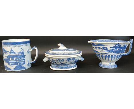Three pieces of 19th century blue and white Chinese Canton export ware - helmet pitcher with angular bamboo handle on pedesta