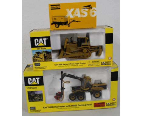 3 die cast models Atlas Copco XAS6 Portable compressor 1/25, CAT D8R Series II Track type tractor 1/50, CAT 580B Harvester wi