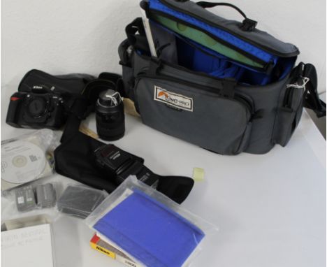 Nikon D200 digital camera body, Nikon camera pouch, Nikon 24-120mm F315 -5.6 zoom lens, Nikon SB800 autofocus Speedlight flas