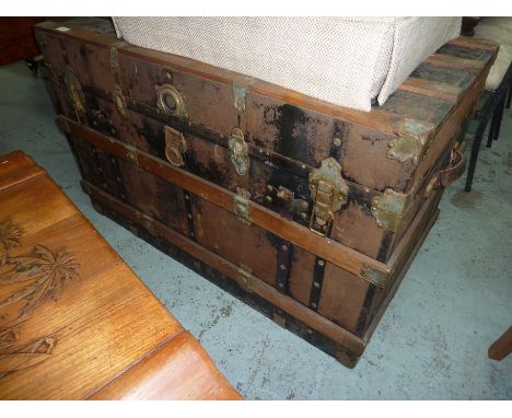 Wooden slatted and bound flat top trunk