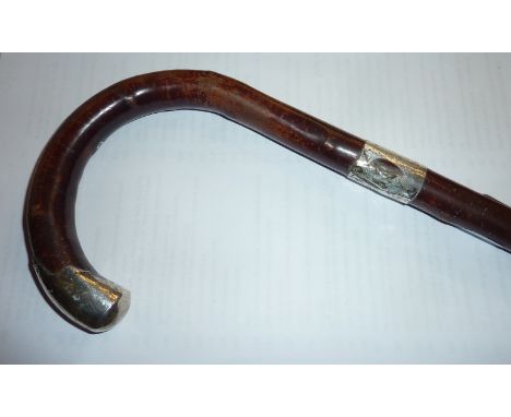 Walking stick with silver collar and silver tip