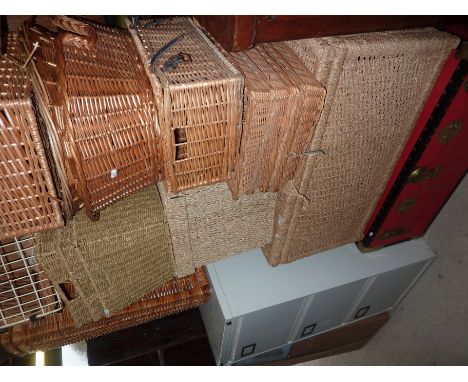 Trunk and large selection of wicker and rush storage baskets, trays etc
