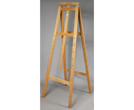 A beech fold-away artist’s studio easel (incomplete),
