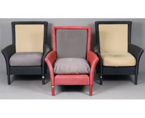 Three Lloyd Loom armchairs (two painted blue, the other red), each inset loose cushion to the seat &amp; back, &amp; with a s