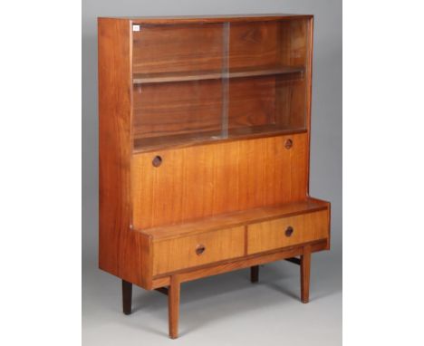 A mid-20th century G-Plan type teak side cabinet fitted with a shelf to top enclosed by a pair of glass sliding doors above a