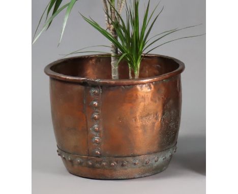 A 19th century riveted copper cauldron, 43cm diameter x 32cm high; together with a brass fender, 125cm long; various brass fi