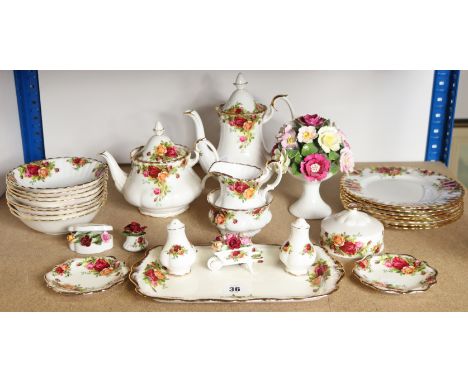 A Royal Albert bone china “Old Country Roses” seventy-two-piece extensive part dinner, tea &amp; coffee service; &amp; a Newt