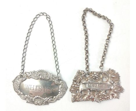 Two silver hallmarked decanter labels with unmarked chains, the first for brandy is marked London 1802 by Thomas Phipps &amp;