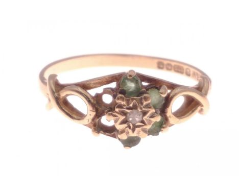 A 375 hallmarked floral set yellow gold ring with green stones (2 missing), size N, gross weight 1.75gApprox 1 pieces