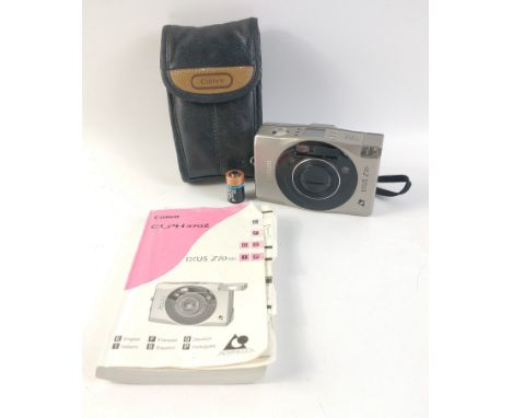 A CANON 1XUS Z70 camera in a soft leather case with the user manualApprox 1 pieces