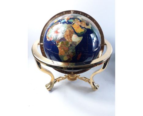 SUPER QUALITY!A LARGE blue based globe with stone inlay on a brass stand. This globe features the countries of the world inla
