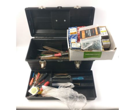 Multi-level tool box and another box containing various screws. Tool box contains various screwdrivers, wire brush, measuring