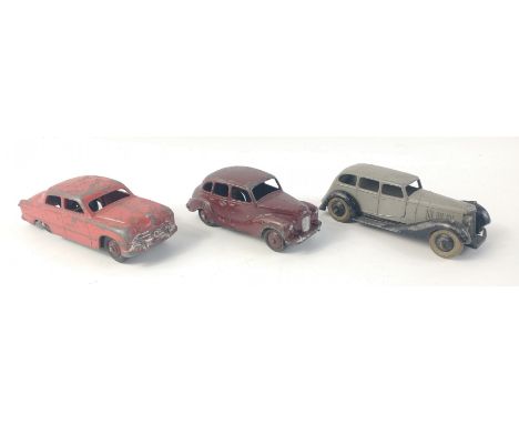 Small collection of three DINKY diecast early models to include Ford Sedan, Austin Devon with maroon body and hubs, Armstrong