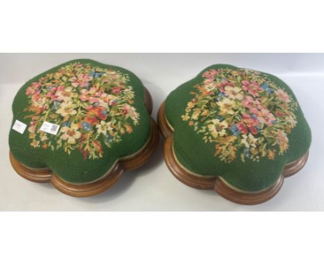 Two handworked tapestry footstools with three ball feet, base 39cm acrossApprox 2 pieces