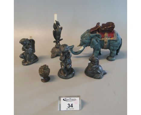 Group of assorted lead and other metal items to include elephant, heron mount, chamber stick, cherub peperette, figural paper