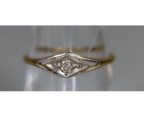 An Art Deco diamond ring.  Ring size M.  Approx weight 1.1 grams.  (B.P. 21% + VAT) 
