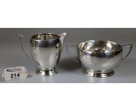 A silver sucrier and cream jug by Deakin & Francis Birmingham 1936 and 1937.  Approx weight 6.87oz.(B.P. 21% + VAT) 