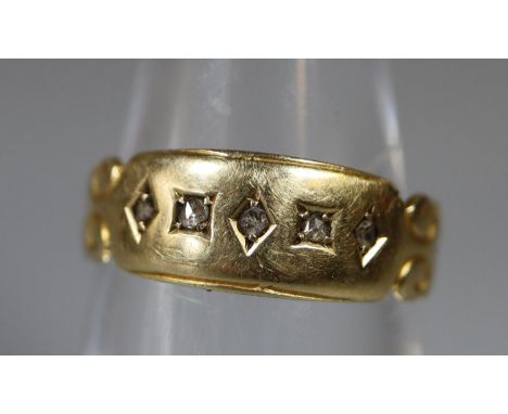 A Victorian 15ct gold diamond set ring.  Ring size K&1/2.  Approx weight 1.9 grams.(B.P. 21% + VAT) 