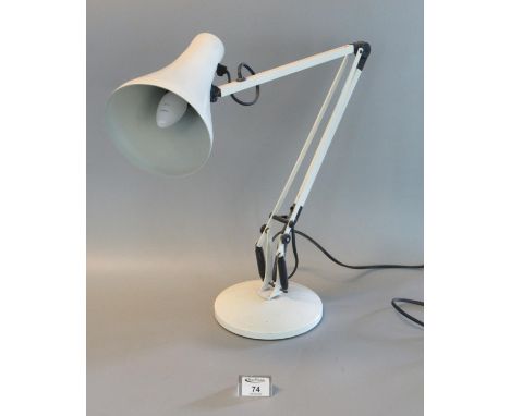 Angle poise white enamelled reading lamp on circular base.(B.P. 21% + VAT) 