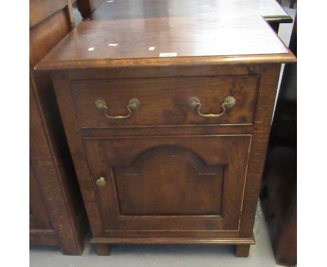 Reproduction 18th century style Welsh oak pot or lamp cupboard with single cock beaded drawer over fielded arch panel cupboar