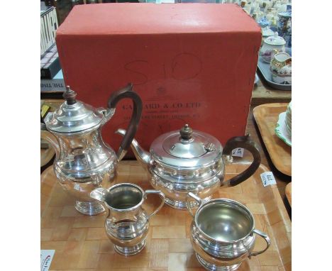 Garrard and Co. silver plated tea set, coffee pot and teapot have wooden handles and knops together with a sugar bowl and mil