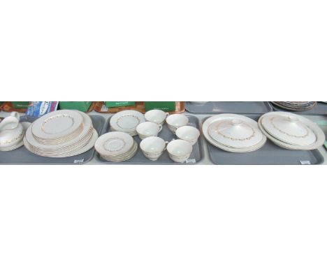 3 Trays of Royal Doulton English translucent china 'Fairfax'.  Part dinner ware, decorated in gilt on a cream ground with rib