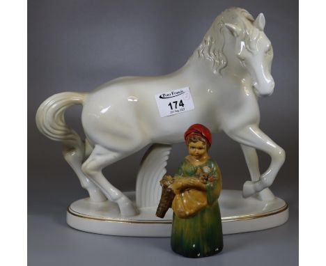 Large porcelain Portuguese Mideramica figurine of a horse 'La Reine' together with a early 20th century Wade cellulose cerami