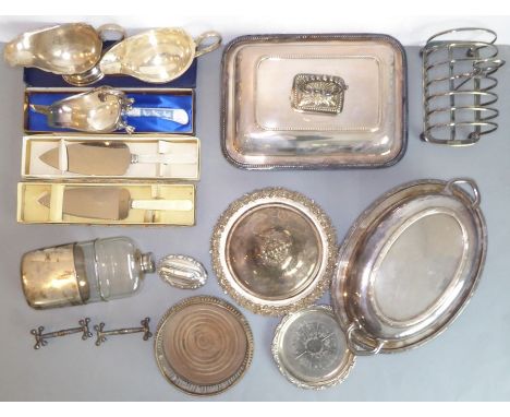 A good selection of mostly late 19th and early 20th century silver plate: a silver-plate-mounted spirit flask, two entrée dis