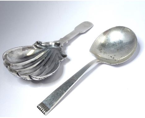 Two silver caddy spoons; one of shell form and with .925 Birmingham assay mark, the other Sheffield 1964 (2)