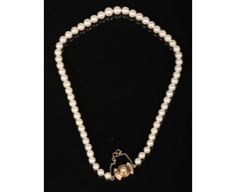 A pearl necklace with 14 carat gold clasp. Pearls each 8mm diameter, 42 grams gross weight, 49cm.  Clasp centre pearl re glue