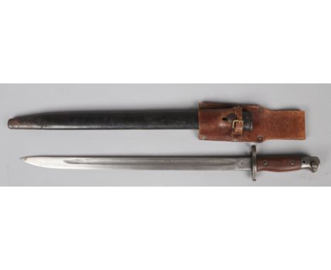 A Lee Enfield SMLE 1907 pattern bayonet with leather mounted metal scabbard and leather frog. Maker Wilkinson, dated 1918, fr