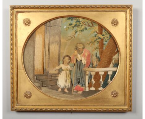 A George III silk needlework picture in gilt frame. Possibly biblical, depicting a terrace scene, an elderly man walking with