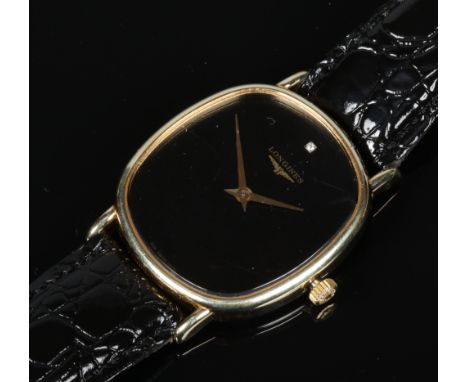 A gentleman's gold plated and stainless steel manual wristwatch. With black rounded rectangular dial having diamond set 12 ho
