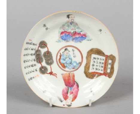 A Chinese Guangxu (1875-1908) ogee shaped saucer. Painted in coloured enamels with figures, a coin bracelet, a sack and havin