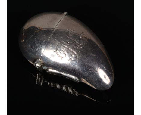 A Victorian silver vesta case of mussel shell form. Engraved R. L. initial. Assayed Birmingham 1891, 5.75cm.  Small dents onl