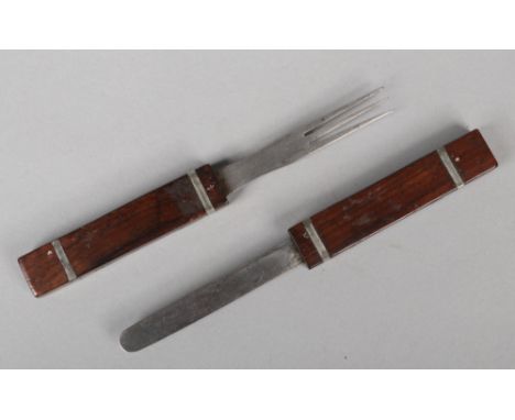 A World War I Officers combination campaign cutlery set with rosewood scales. W. H. Wragg, Sheffield. With broad arrow mark. 