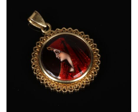 A gold mounted roundel pendant on bale. Set with a Limoges enamel portrait plaque of a young maiden wearing a red hood, 36mm 