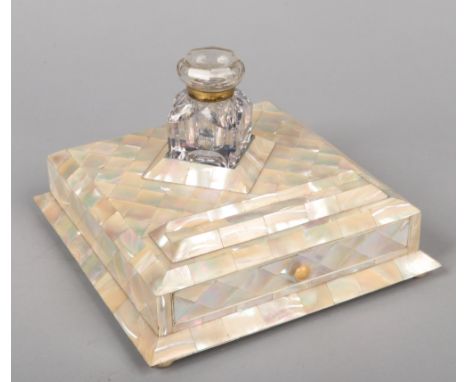 A Victorian mother of pearl parquetry inlaid desk stand.With a glass inkwell, single drawer and associated dipping pen, 24cm 