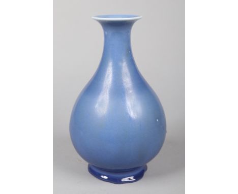 A 19th century Chinese pear formed vase. Decorated in Clair de Lune glaze. Six character Qianlong seal in underglaze blue, 30