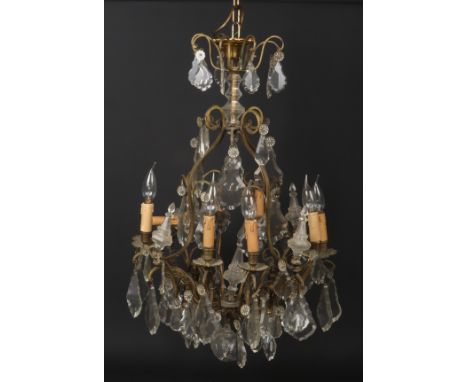 An early-mid 20th century French gilt metal and cut crystal eight branch chandelier, 90cm.  Good condition. Wired and current